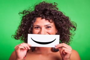 image of Woman with Smiley Emoticon